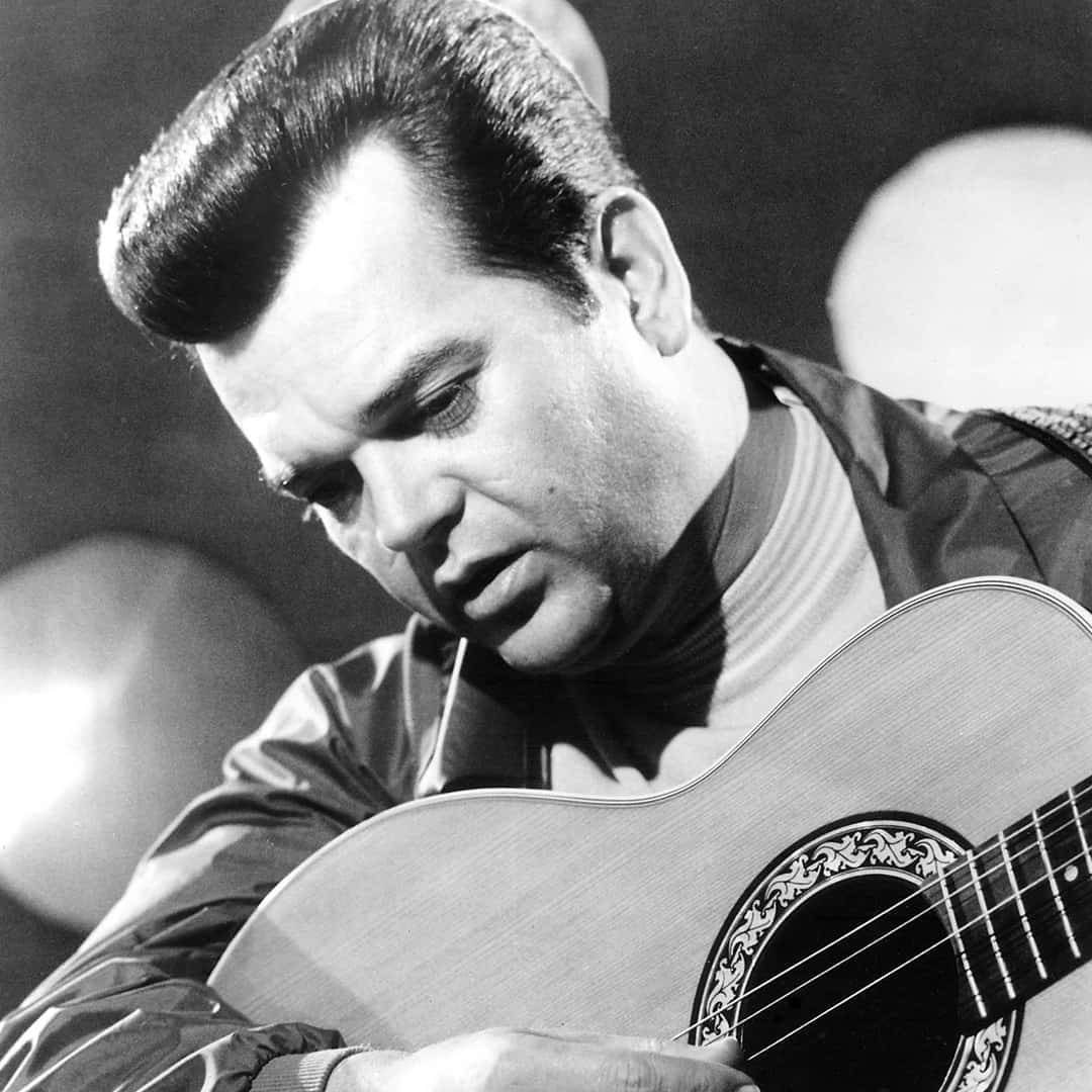 Conway Twitty Soulful Guitar Play Wallpaper