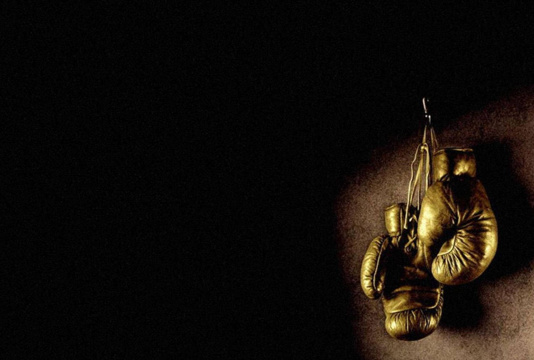 Cool Boxing Gloves Hanging On Wall Wallpaper