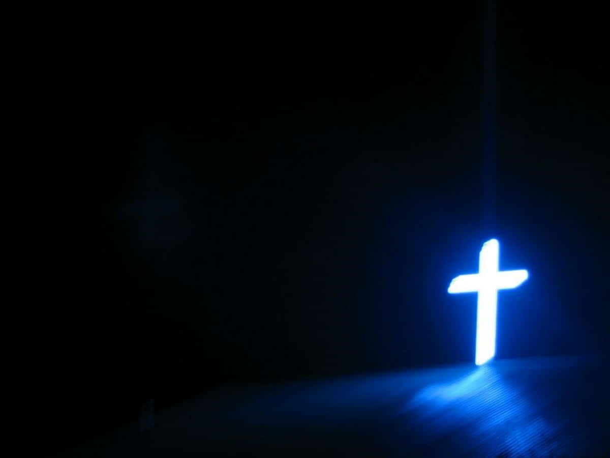 Cool Cross Glowing In Darkness Wallpaper