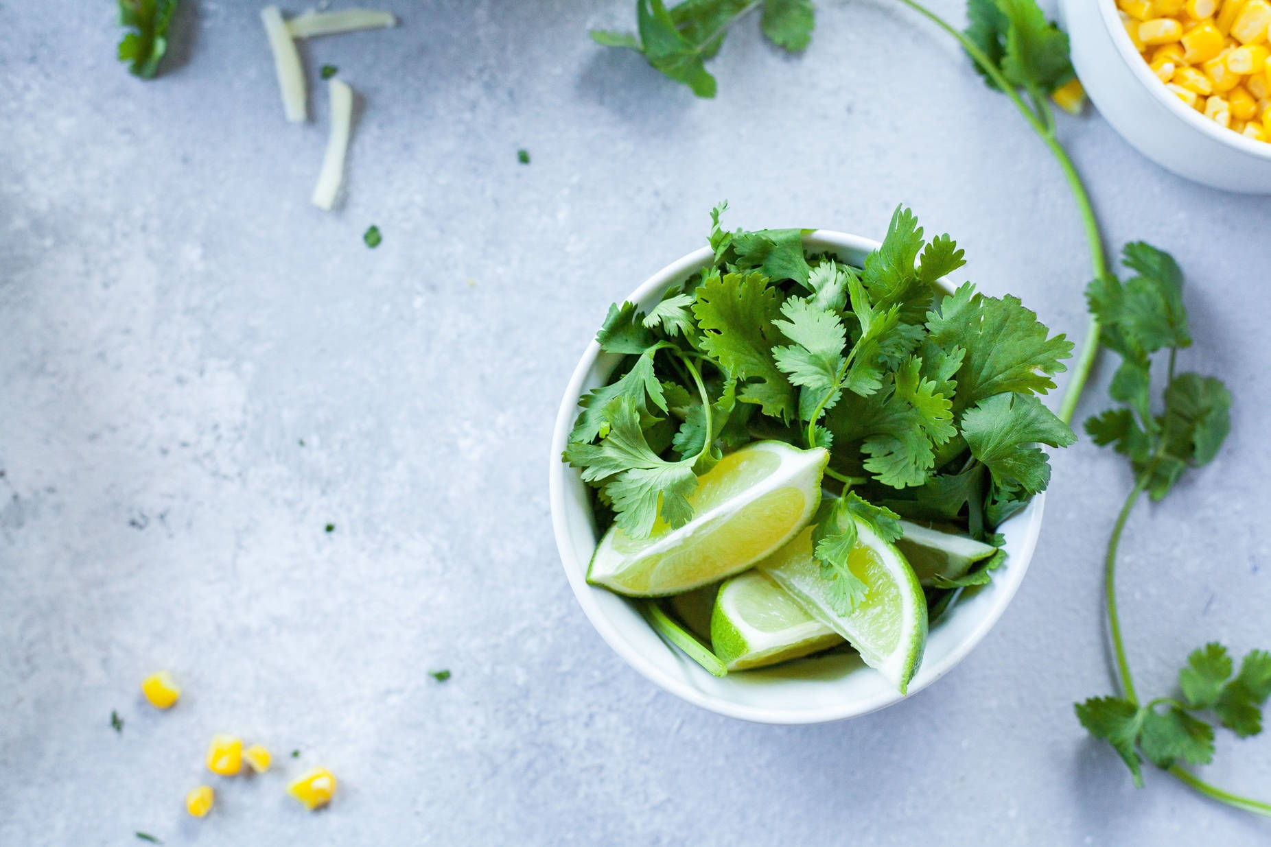 Coriander Herbs And Sliced Limes Overhead Shot Wallpaper