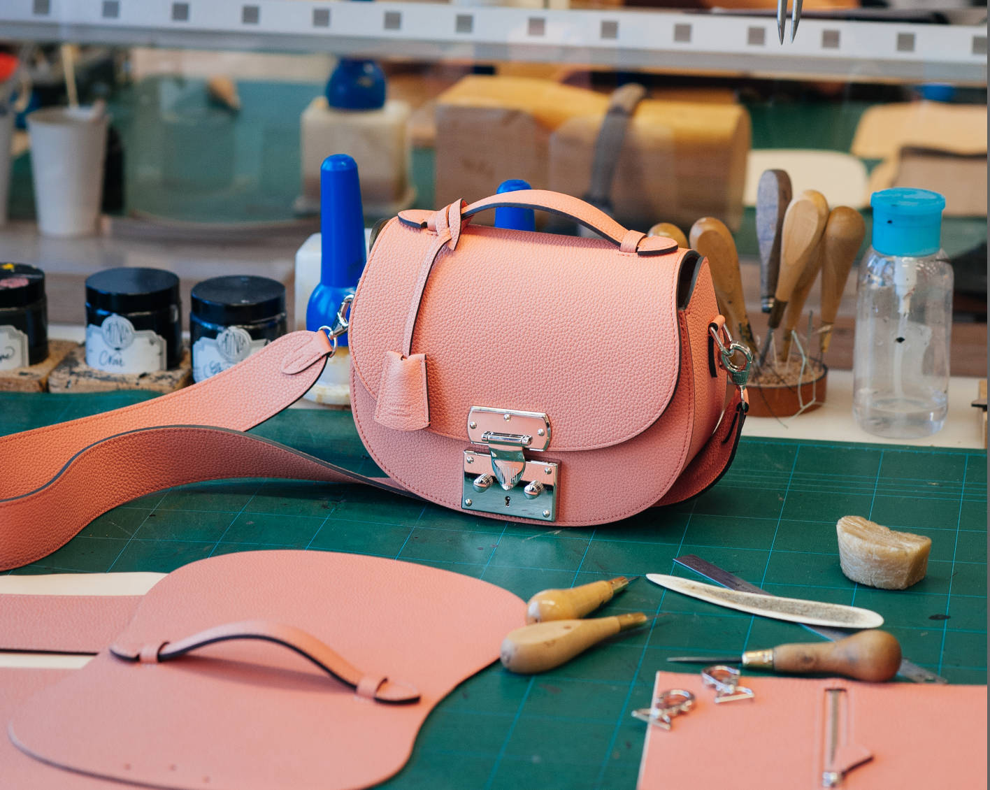 Crafting Luxury: Beautifully Assembling A Moynat Bag Wallpaper