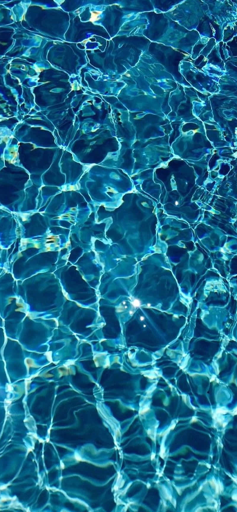 Crystal Clear Blues Of A Stunning Pool Wallpaper