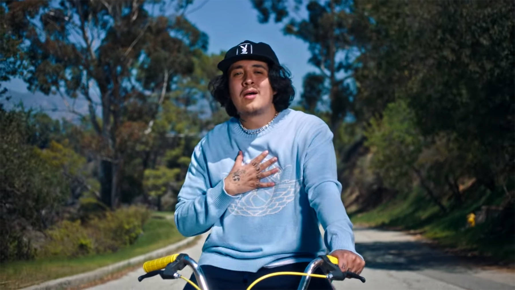 Cuco Riding A Bike Wallpaper