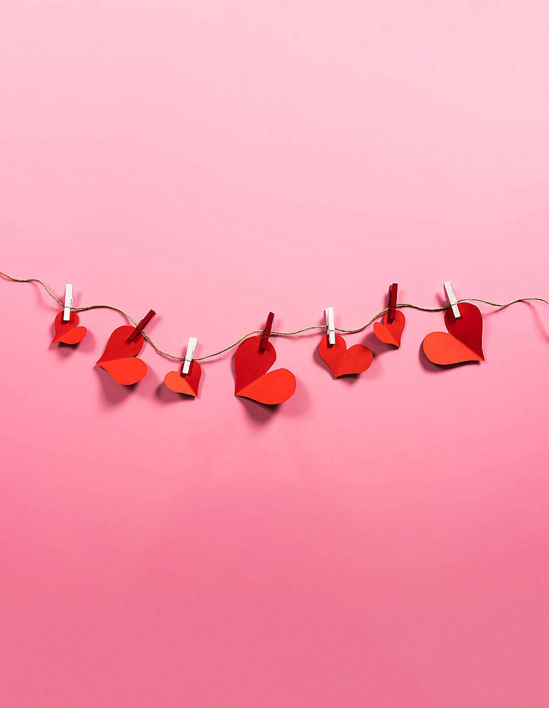 Cute Hd Heart Cut-out On String Wallpaper