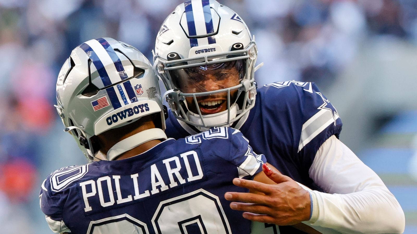 Dallas Cowboys Hugging And Smiling Wallpaper