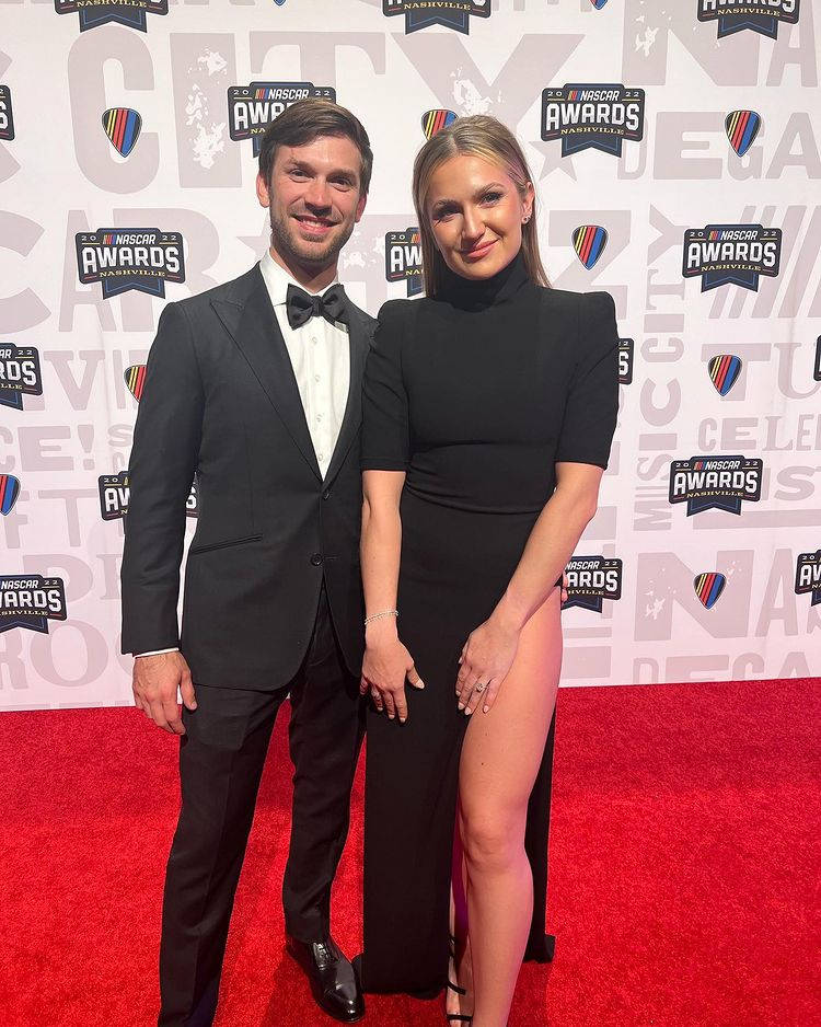 Daniel Suarez And His Wife Dressed In Black Wallpaper