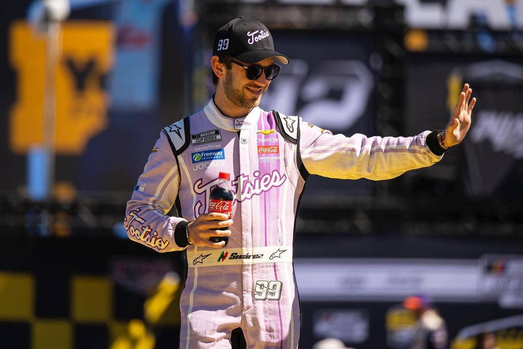 Daniel Suarez Holding Coca-cola Wallpaper