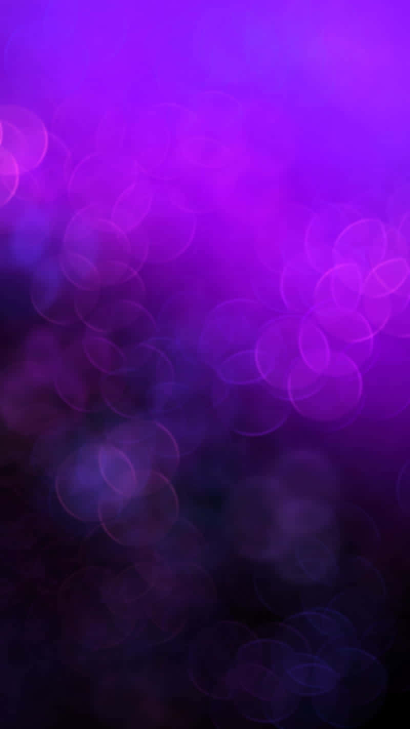 Dark Gradient With Shimmering Purple Shades Wallpaper