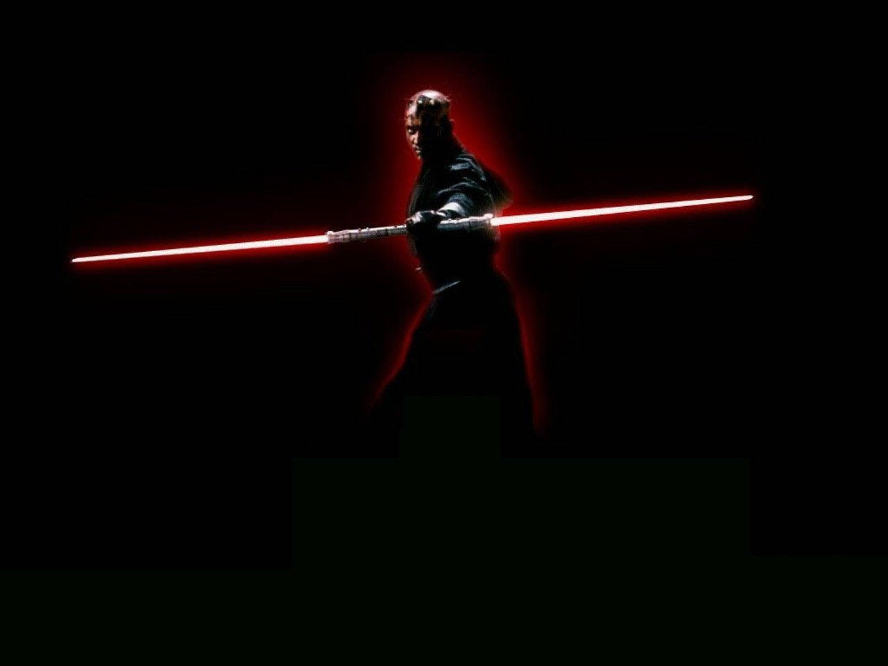 Darth Maul With His Red Lightsaber Wallpaper