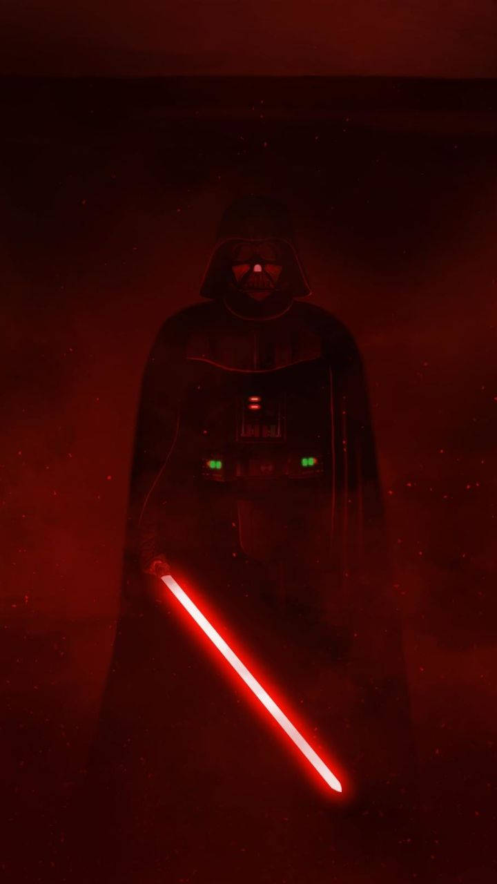 Darth Vader Unleashing His Red Lightsaber Wallpaper