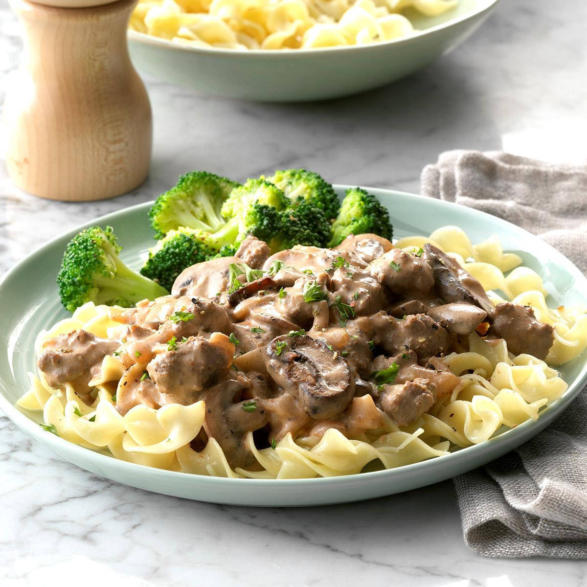 Delicious Beef Stroganoff Served Over Pasta With A Side Of Broccoli Wallpaper