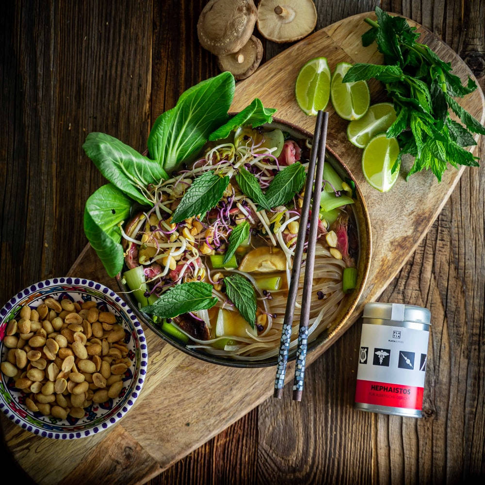 Delicious Bowl Of Authentic Vietnamese Pho With Healthy Green Vegetables Wallpaper