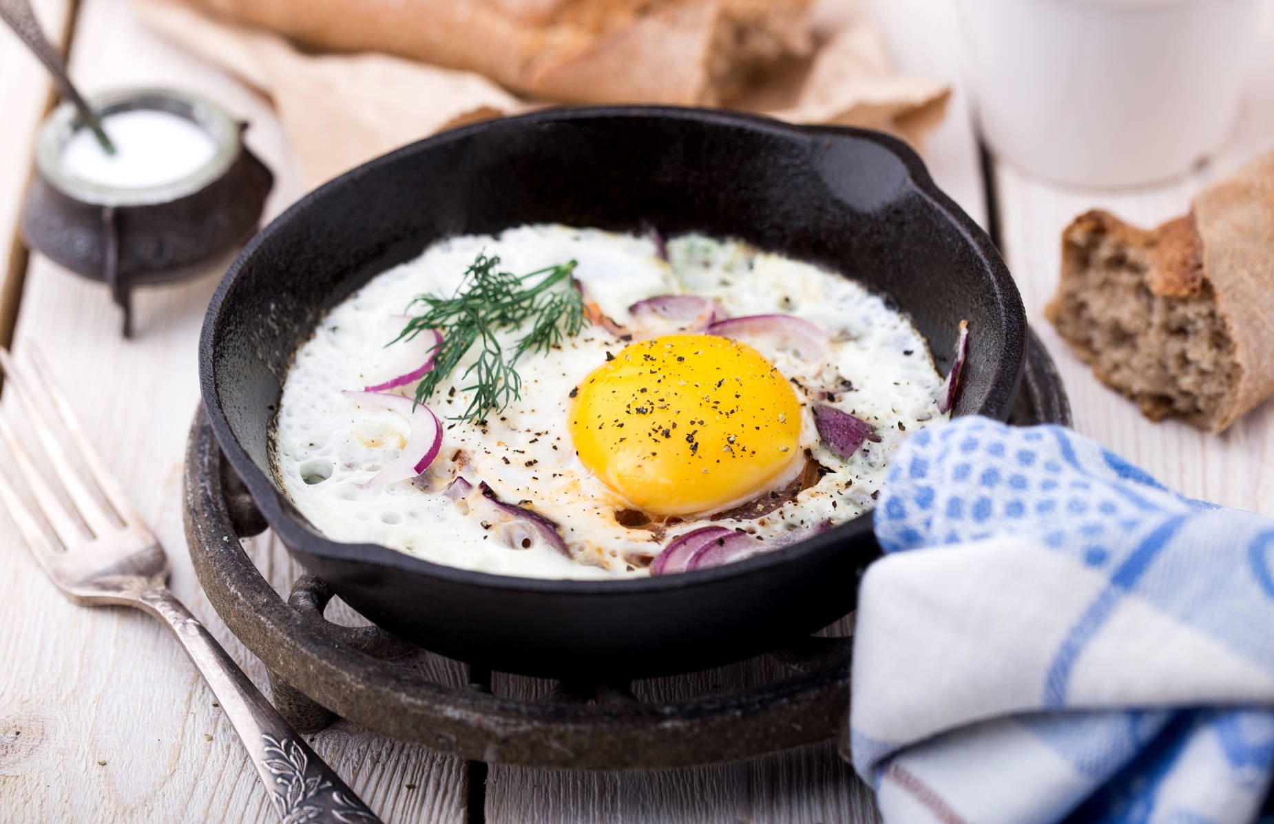 Delicious Fried Egg Seasoned With Herbs Wallpaper