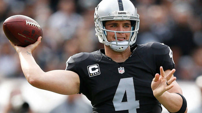 Derek Carr Ready To Throw The Ball Wallpaper