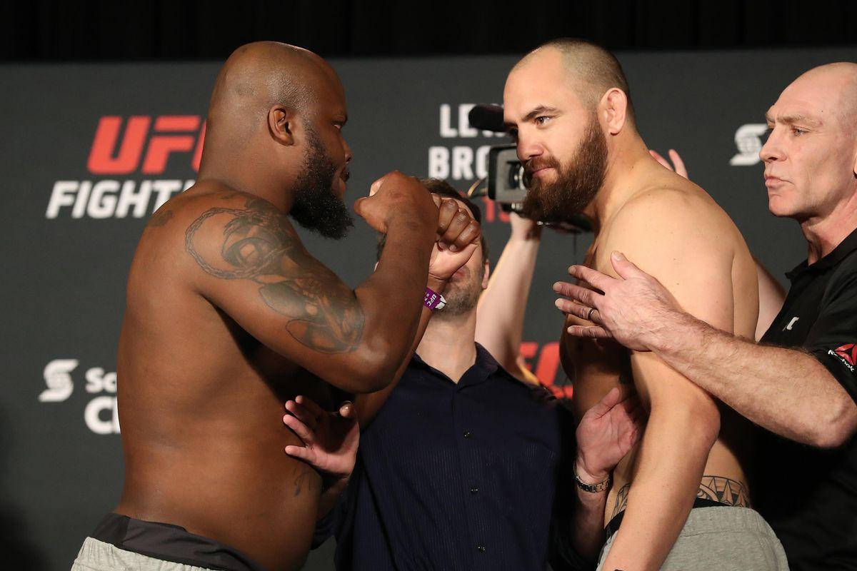 Derrick Lewis Showing Fists To Travis Browne Wallpaper