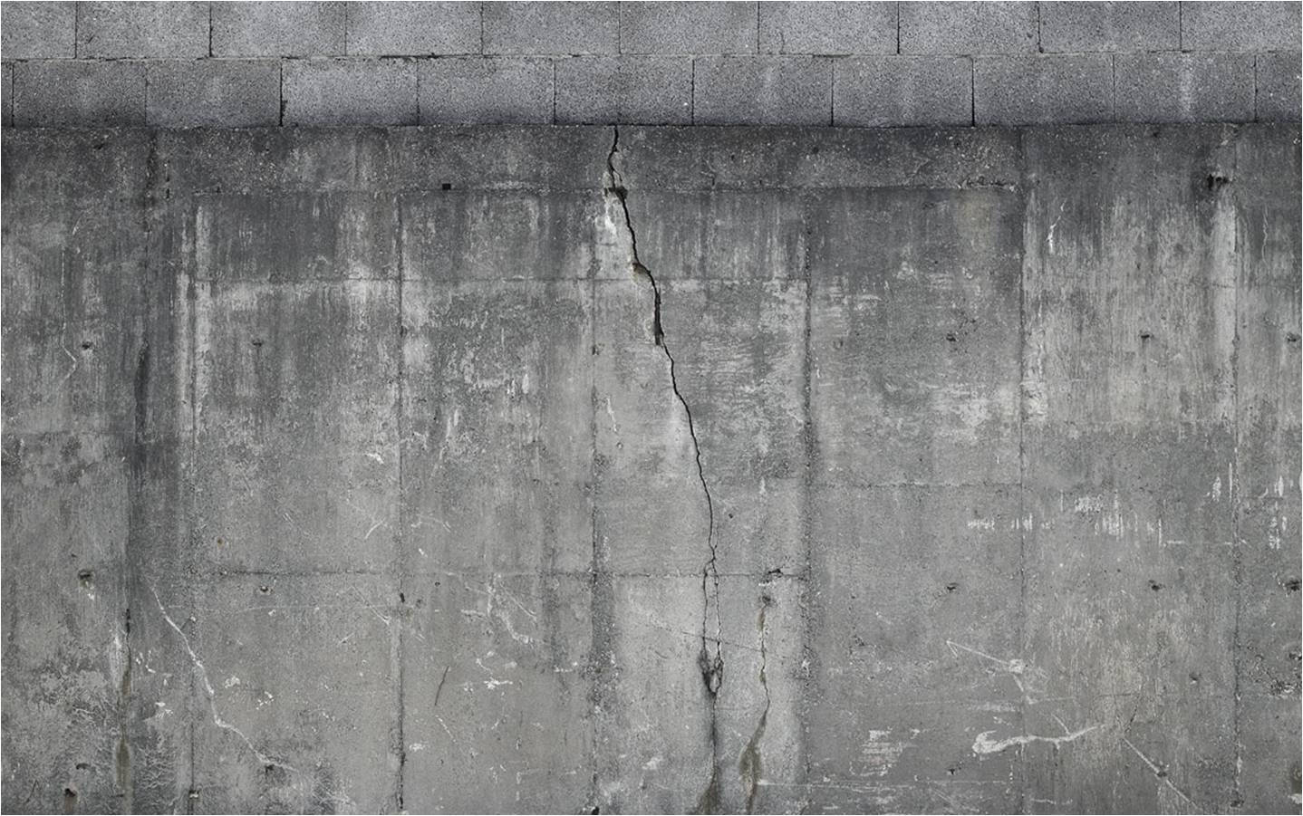 Detailed View Of A Wide Uneven Concrete Wall Wallpaper