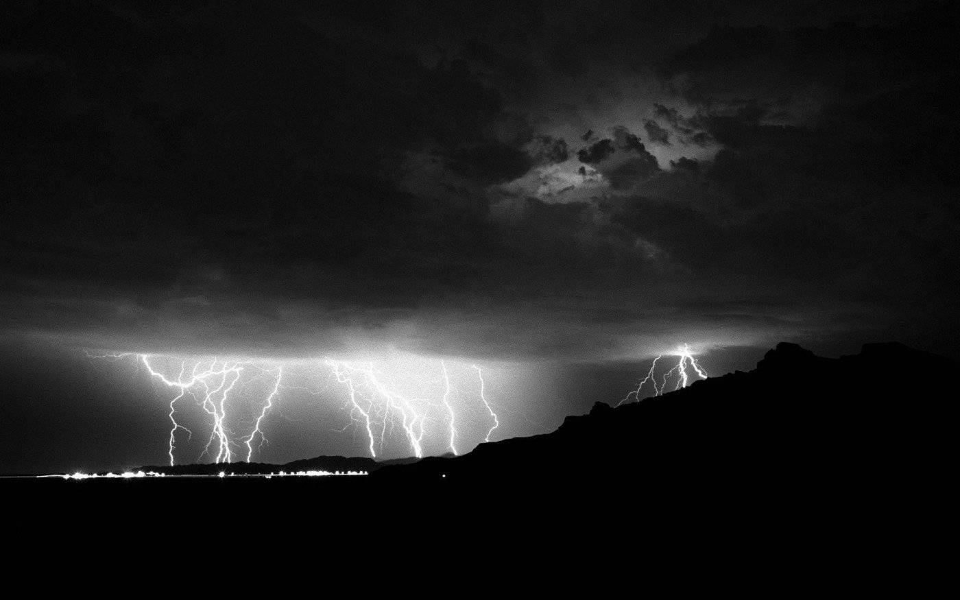 Distant Black And White Thunderstorm Wallpaper