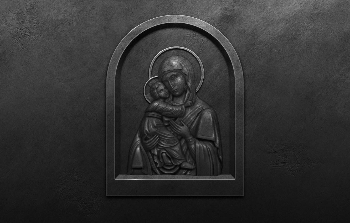 Divine Sculpture Of Virgin Mary And Baby Jesus Wallpaper