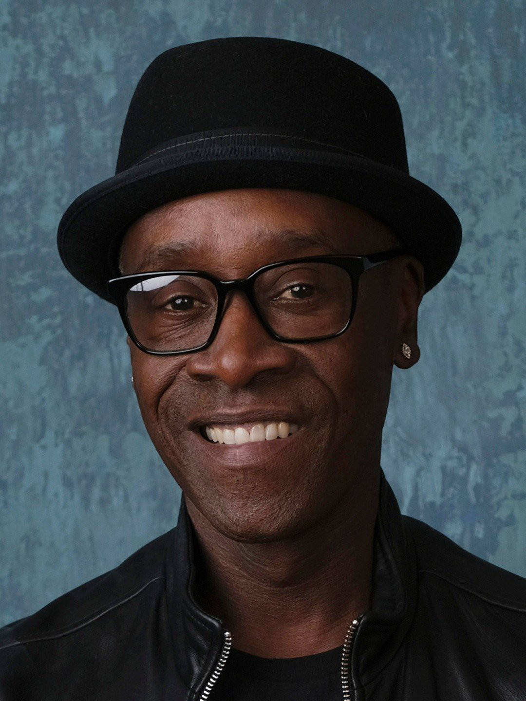 Don Cheadle Displaying Cool Confidence In A Stylish Hat Wallpaper