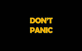 Don’t Panic Yellow Black Background Wallpaper