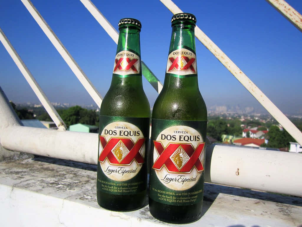 Dos Equis Beer Bottles Outdoor Setting Wallpaper