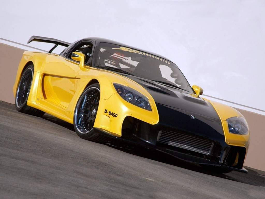 Dramatic Fast And Furious Cars In Yellow And Black Wallpaper