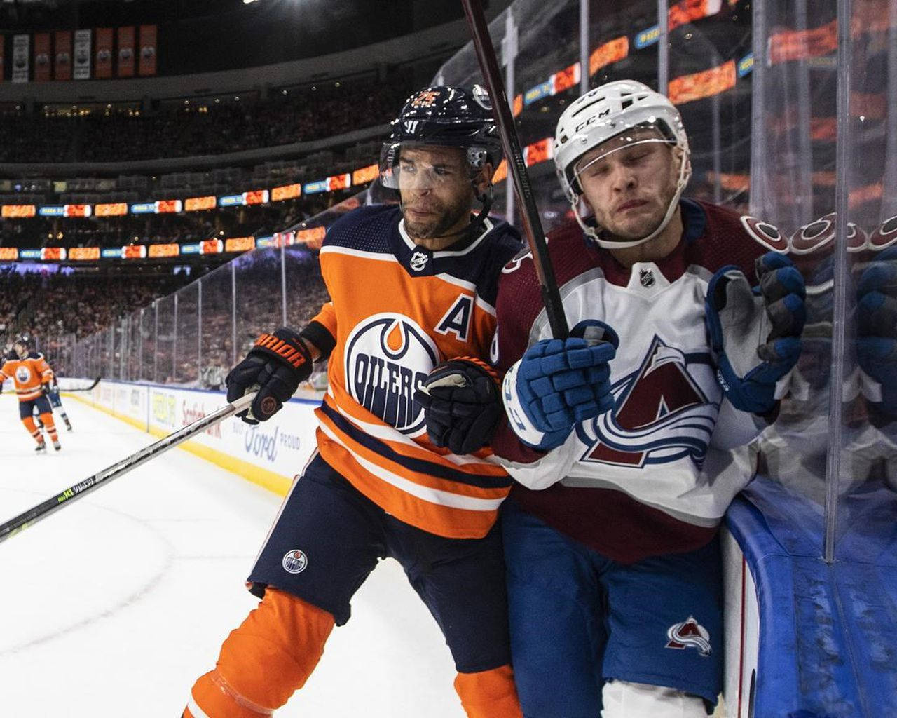 Edmonton Oilers Darnell Nurse And Colorado Avalanche Mikko Rantanen Wallpaper