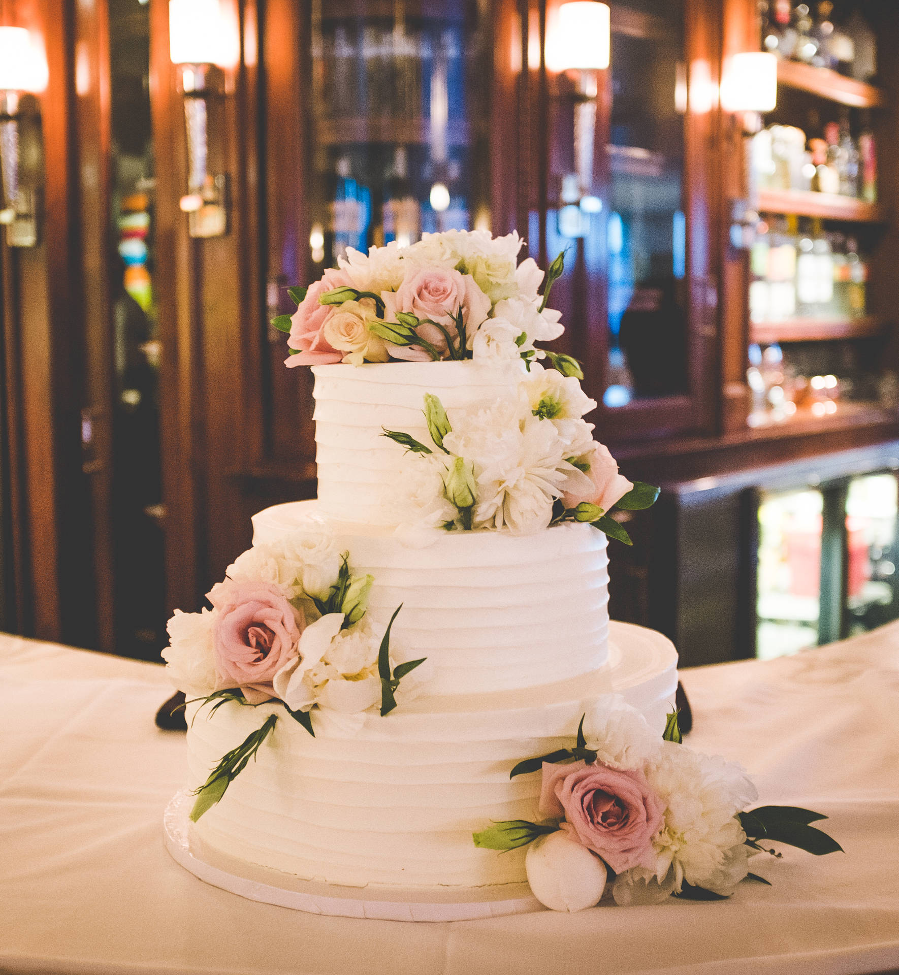 Elegant White Floral Detail Wedding Cake Wallpaper