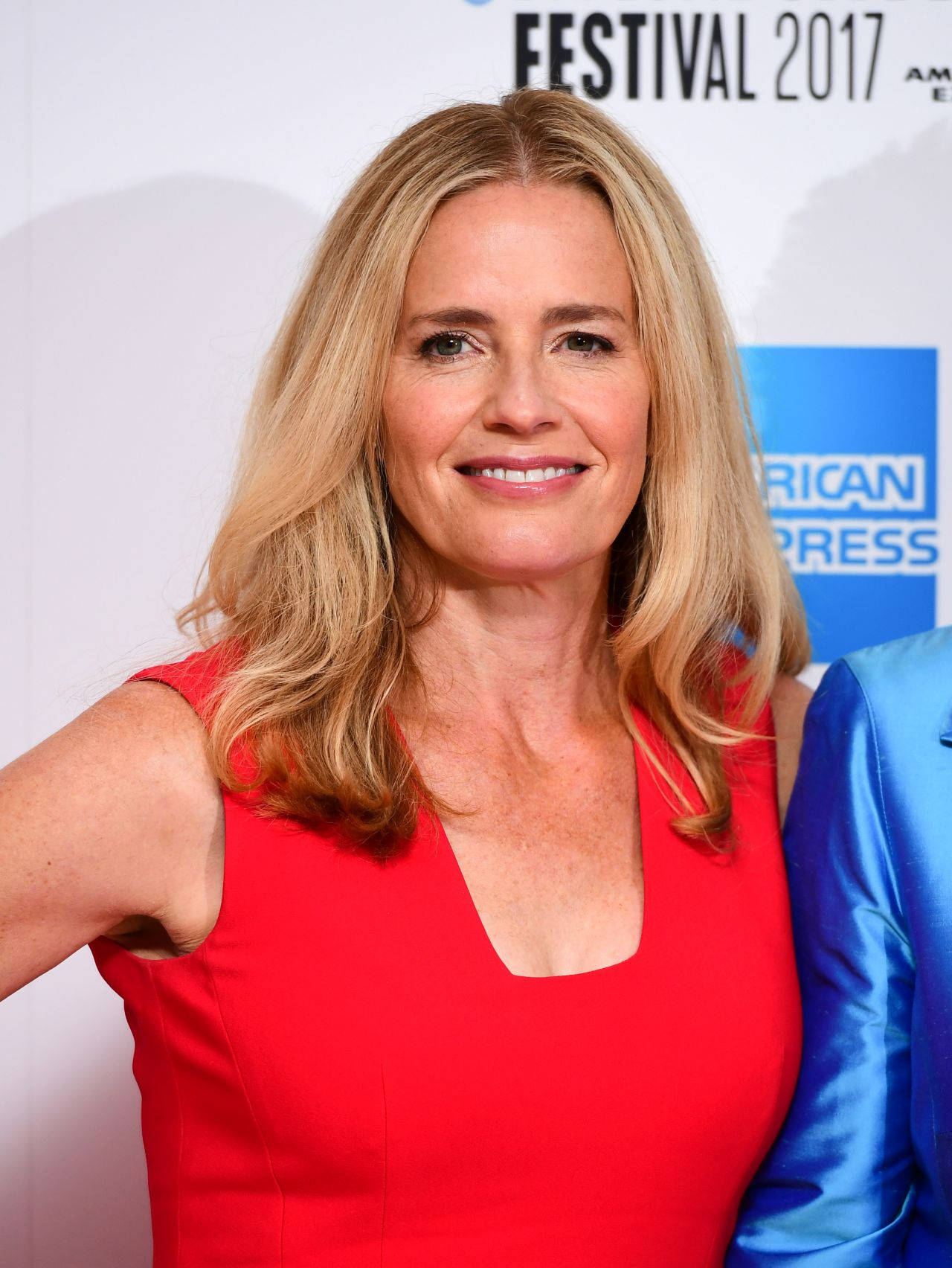 Elisabeth Shue Wearing A Red Dress Smiling During London Film Festival 2017 Wallpaper