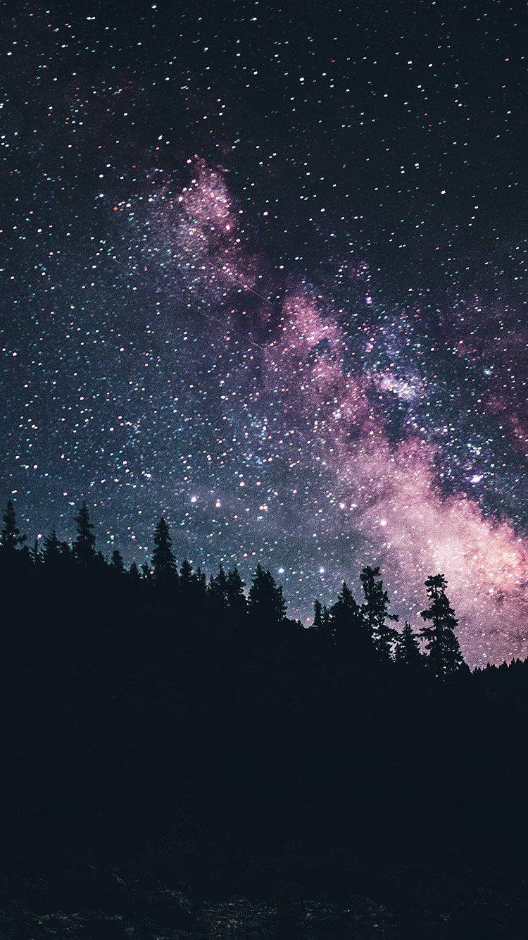 Embrace The Vast Beauty Of The Night Sky Wallpaper