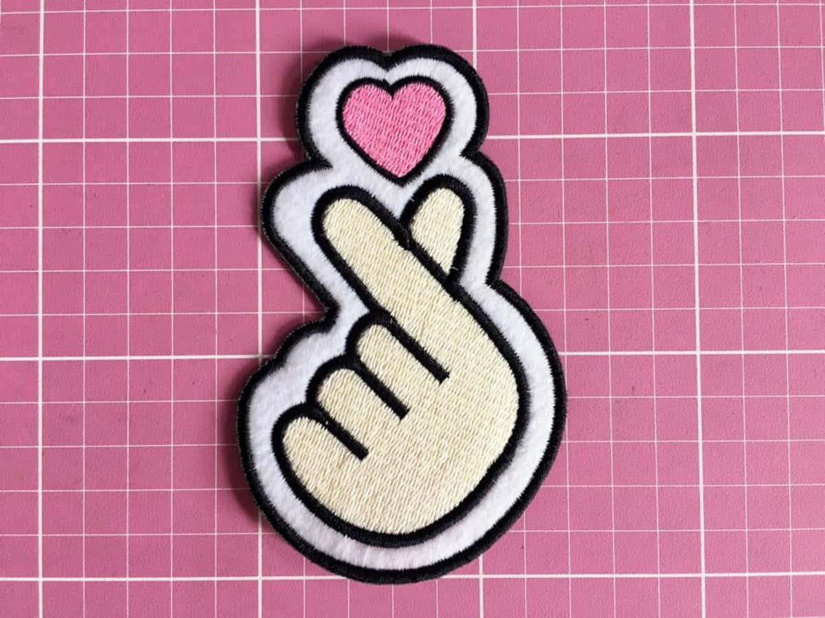 Embroidered Bts Finger Heart Pink Wallpaper