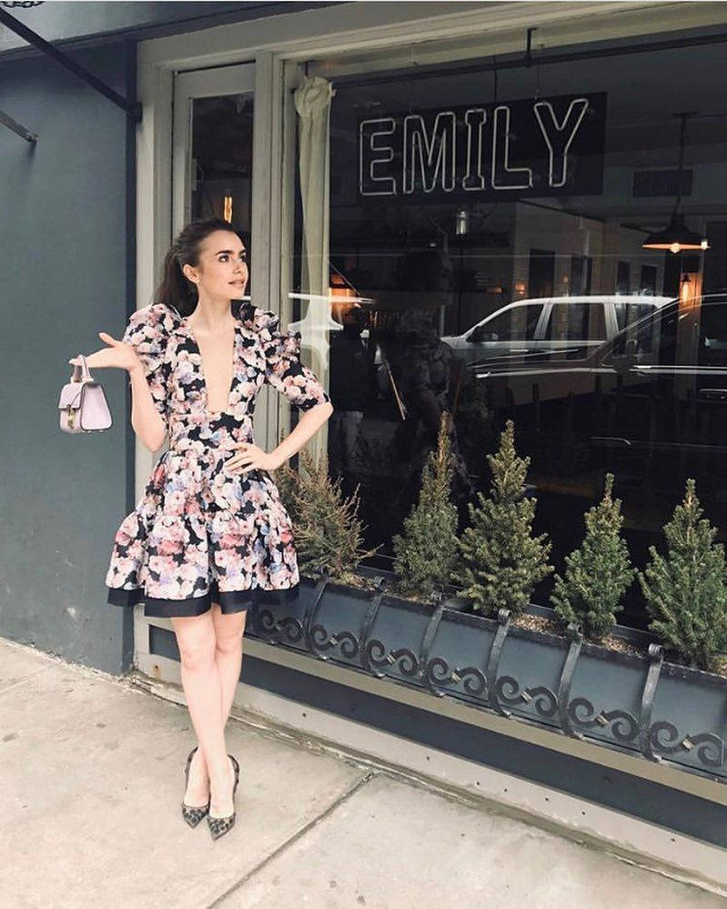 Emily In Paris Looking Pretty In Her Floral Dress Wallpaper