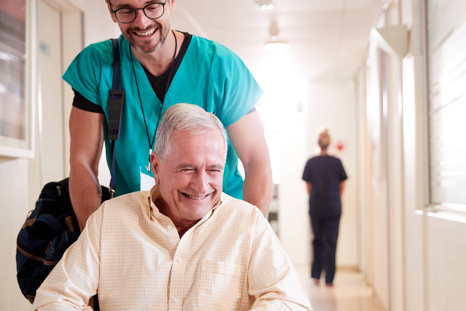 Empathetic Healthcare: Disabled Man In Wheelchair Wallpaper