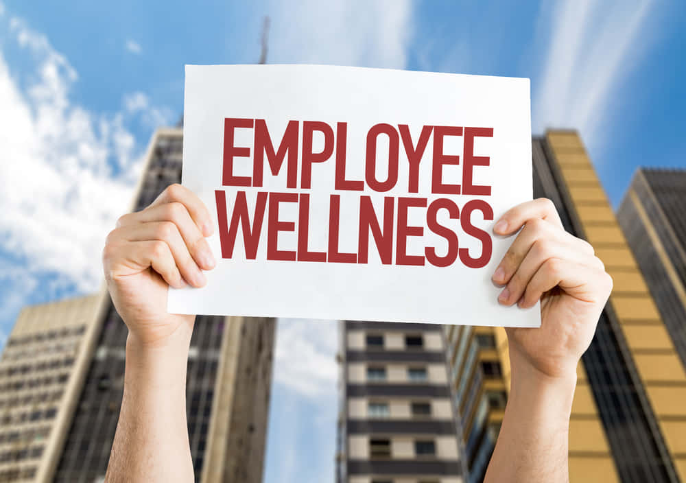 Employee Wellness Sign Urban Backdrop Wallpaper