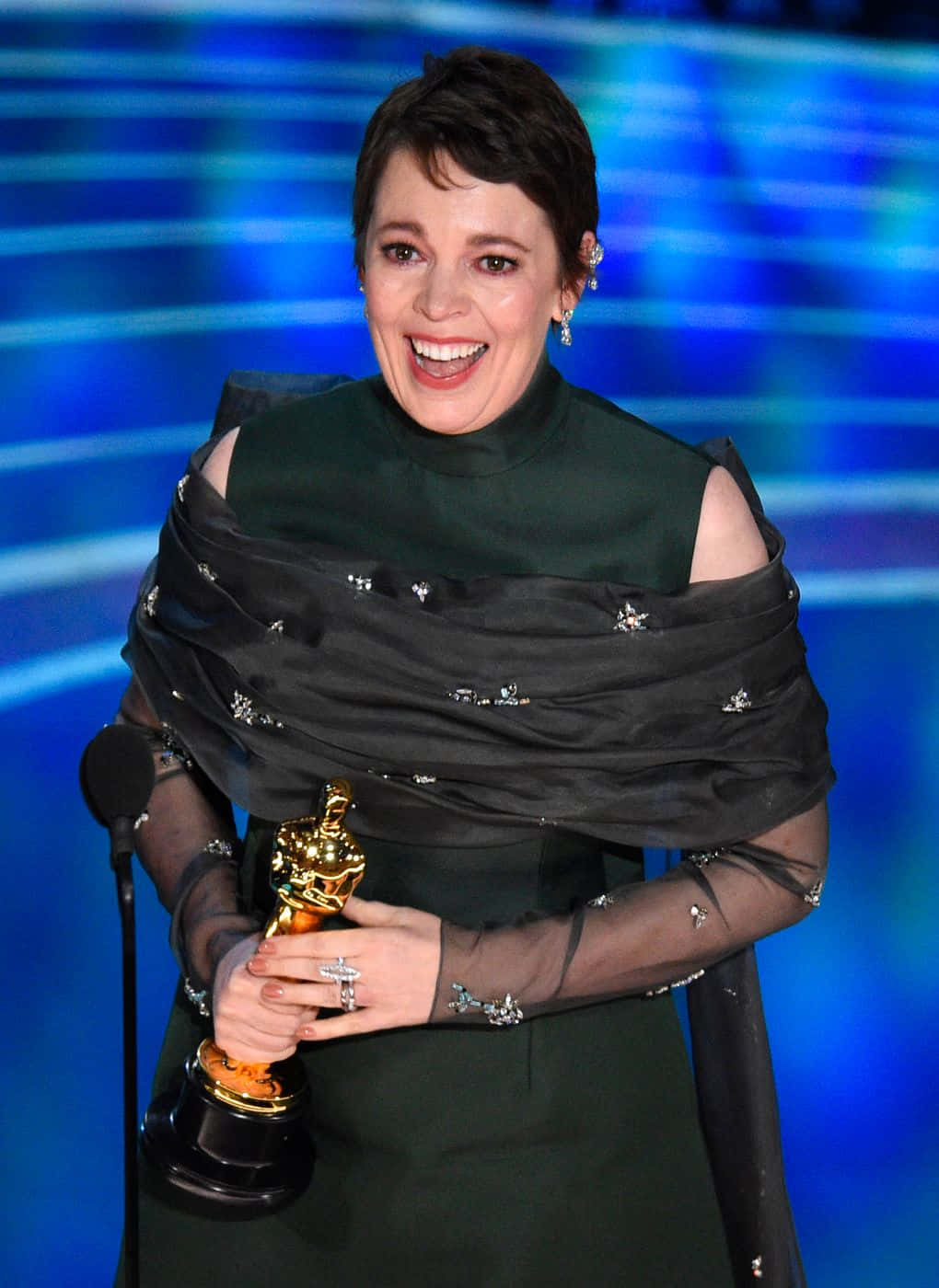 English Actress Olivia Colman At A Red Carpet Event Wallpaper