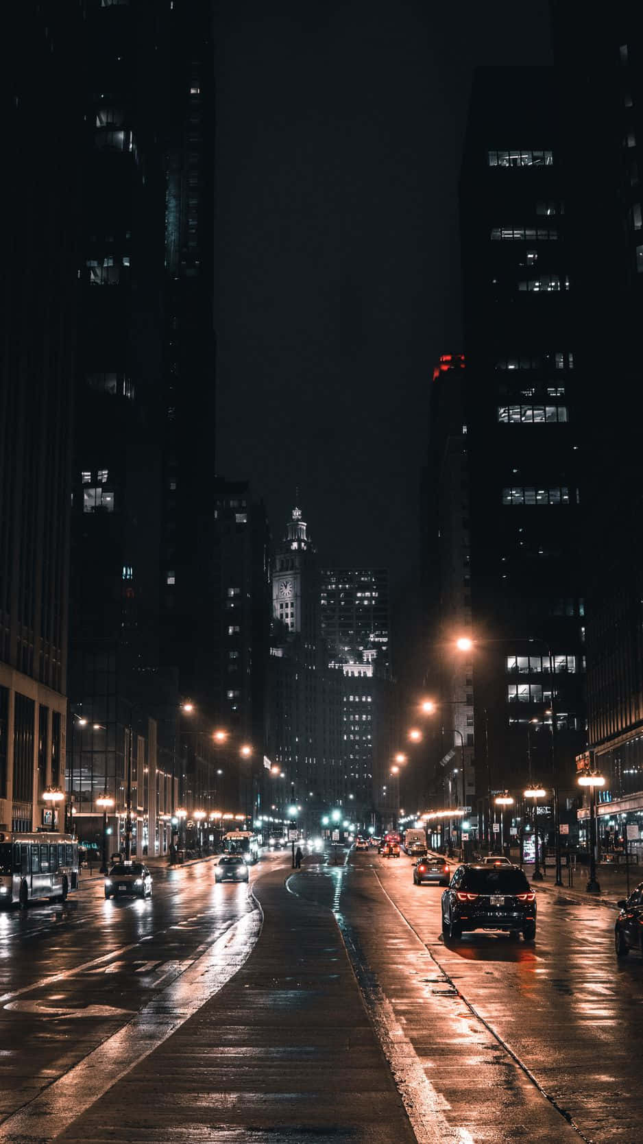 Enjoy The Stunning Skyline Of Chicago At Night Wallpaper