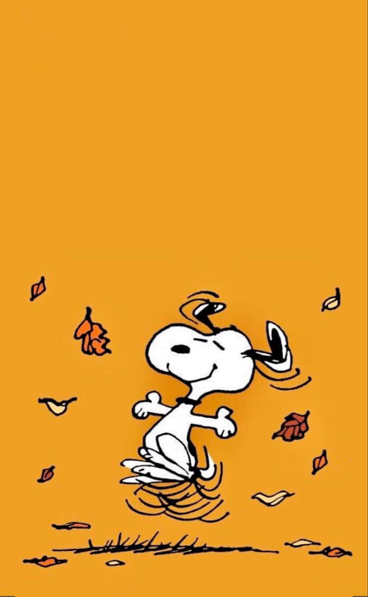 Enjoy The Tranquility Of A Fall Day With Snoopy Wallpaper