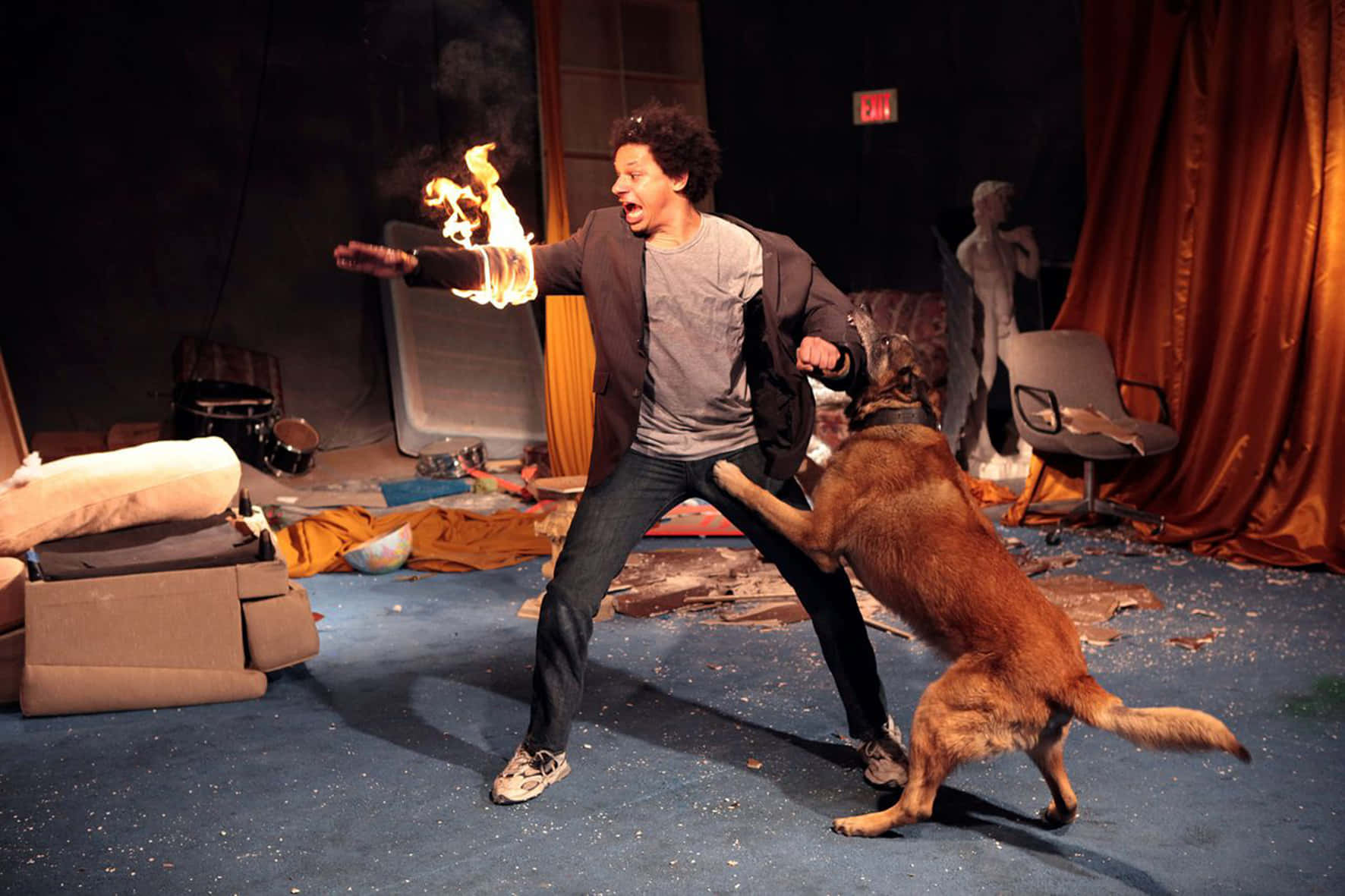 Eric Andre Flaming Arm Dog Attack Wallpaper