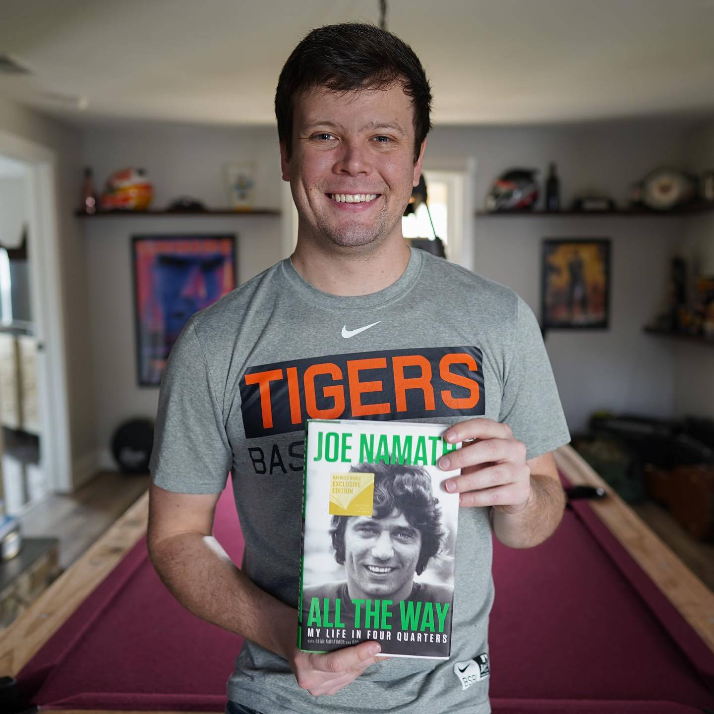 Erik Jones With Joe Namath Book Wallpaper