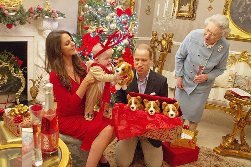 Exciting Pile Of Christmas Presents Under A Glowing Christmas Tree Wallpaper