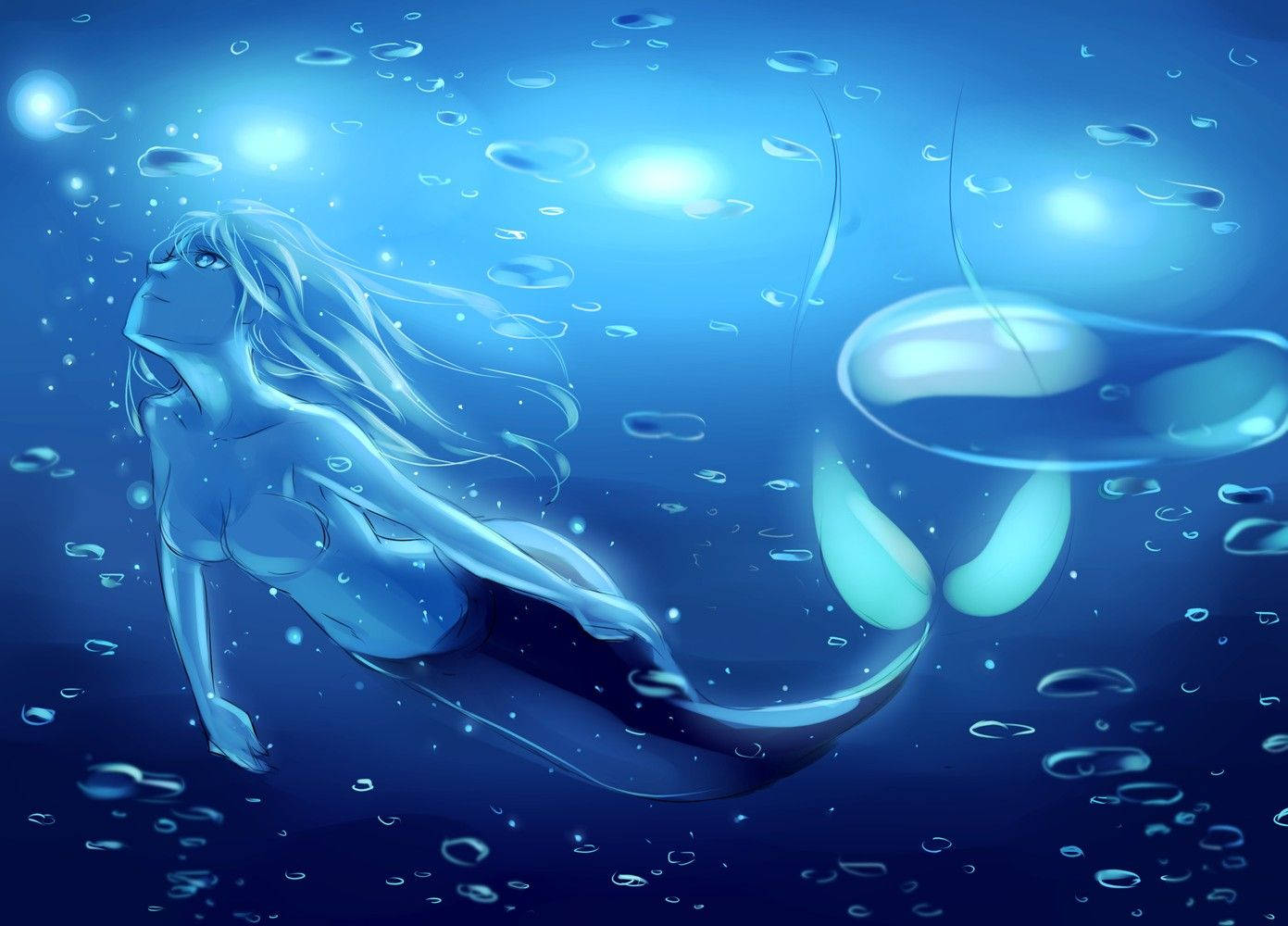 Explore The Luminous Blue Depths Of The Sea Wallpaper