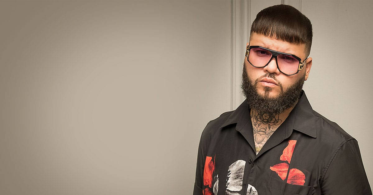 Farruko On Black Polo Wallpaper