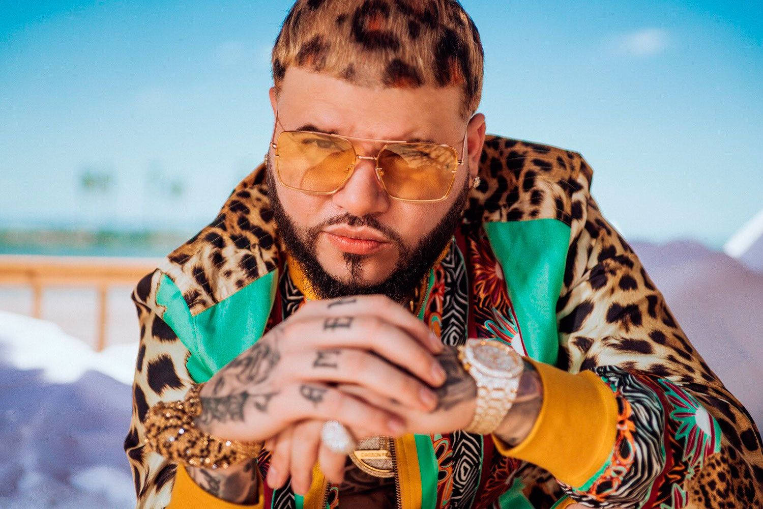 Farruko On Jaguar Pattern Attire Wallpaper