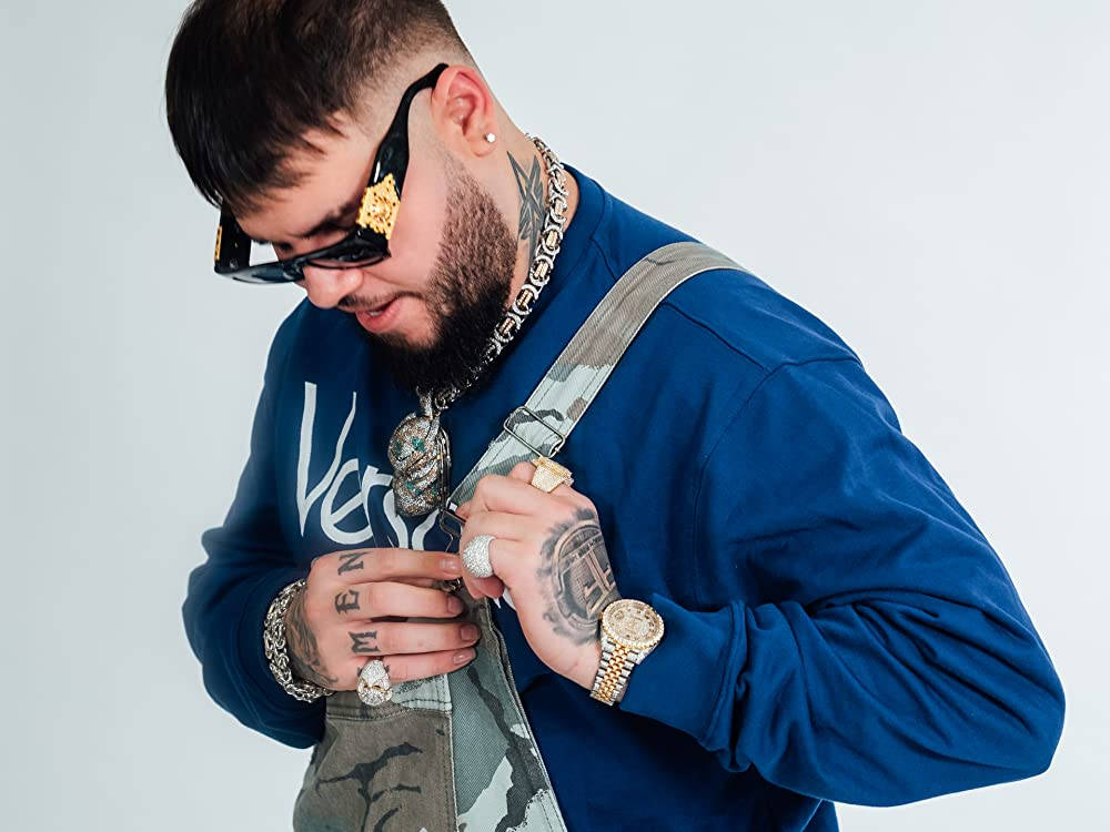 Farruko Wearing A Jumper Wallpaper