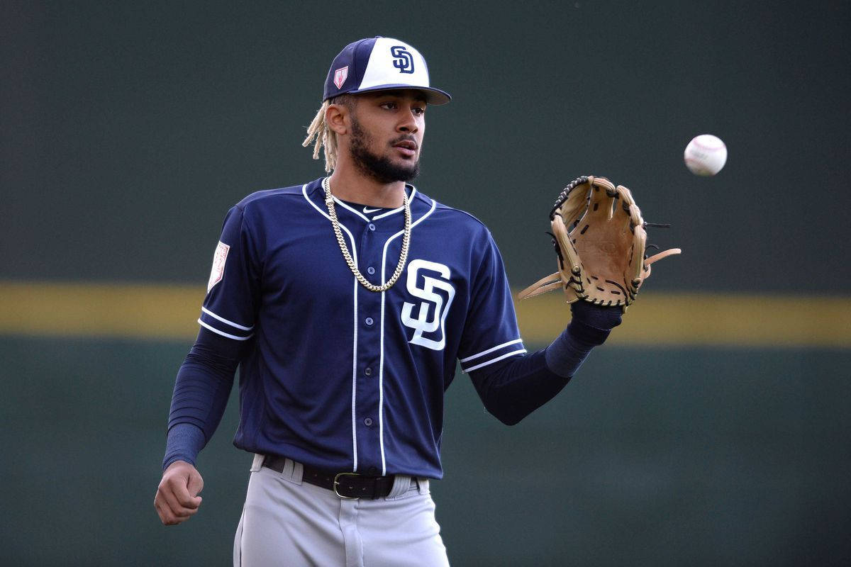 Fernando Tatis Jr. Making An Incredible Catch Wallpaper