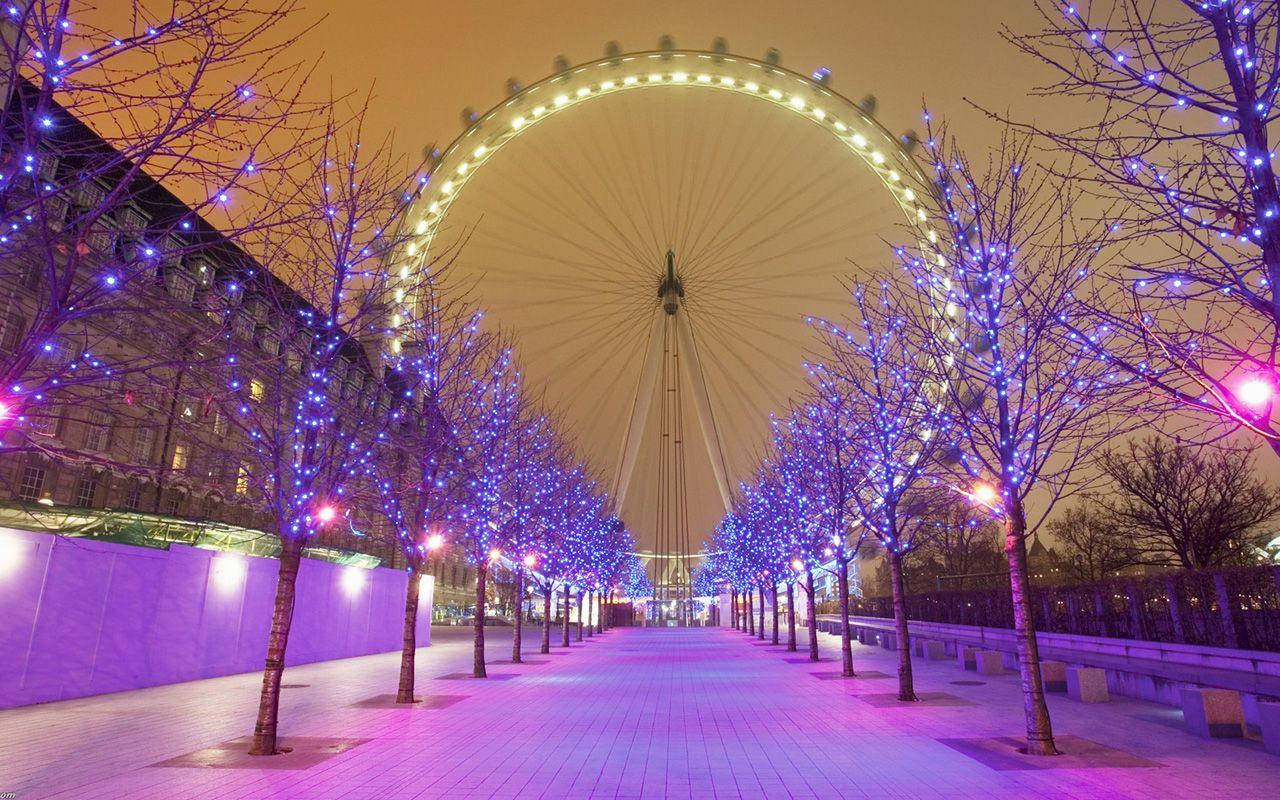 Ferris Wheel With Leafless Trees Wallpaper