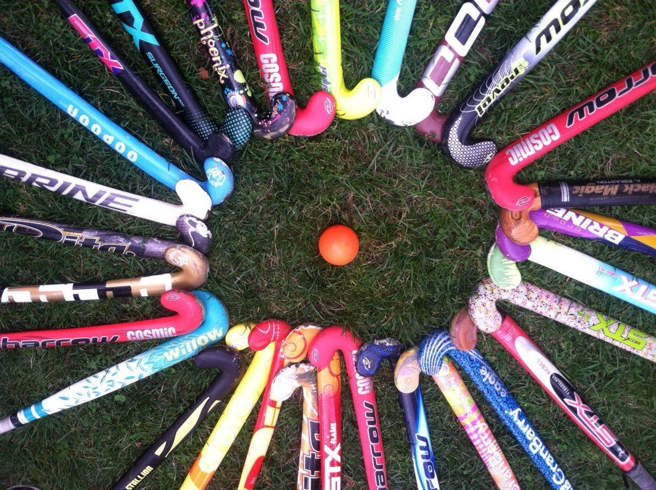 Field Hockey Sticks In Circle Wallpaper