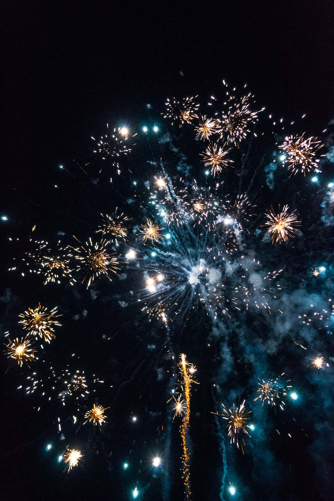 Fireworks Display Blue And Yellow Wallpaper