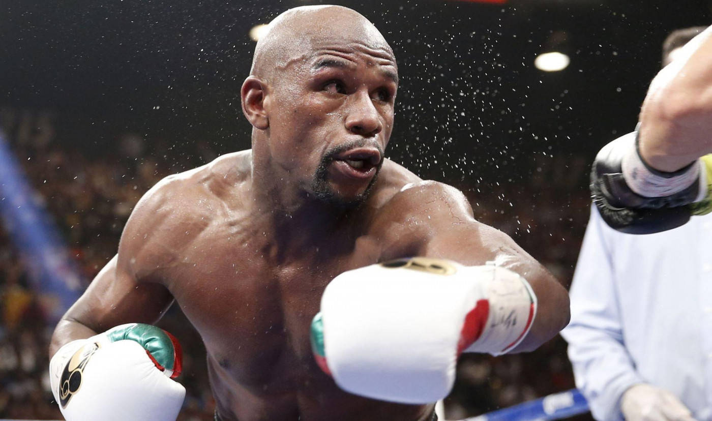 Floyd Mayweather Knocking Sweat Off His Foe Wallpaper