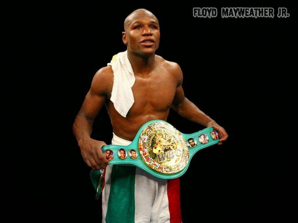 Floyd Mayweather Putting On The Belt Wallpaper